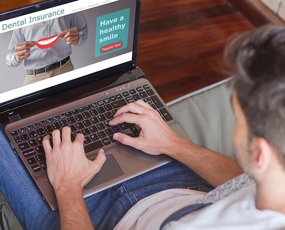 Patient in Coppell reviewing dental insurance