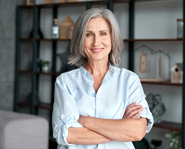 Woman smiling with arms crossed