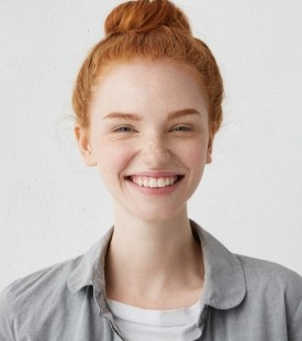 red head woman smiling