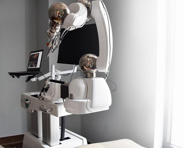 Robot assisted dental implant technology in oral surgery treatment room