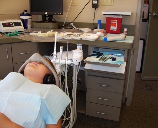 Patient under general anesthesia during oral surgery