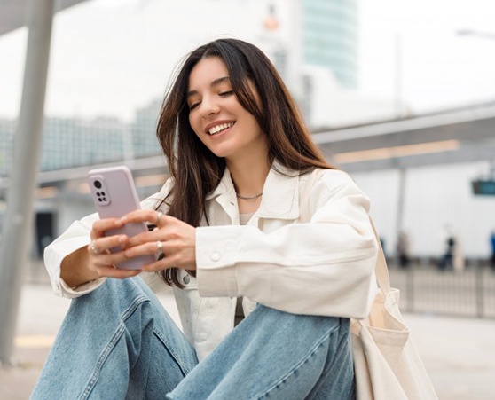 Lady makes shape of a heart with her hands